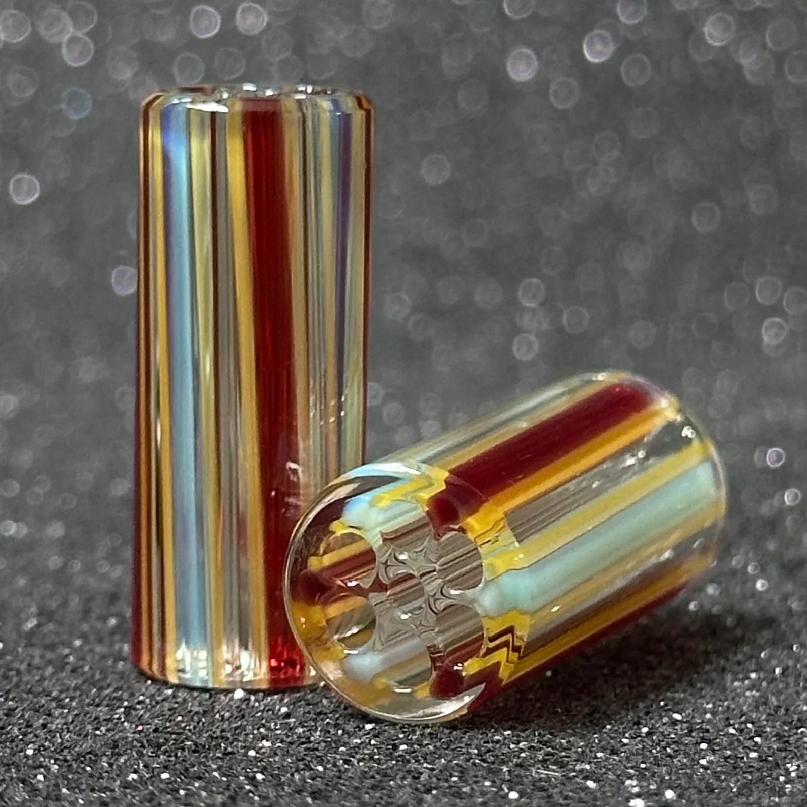 Red blue yellow and amber handmade glass tips from the Triad Shift drop