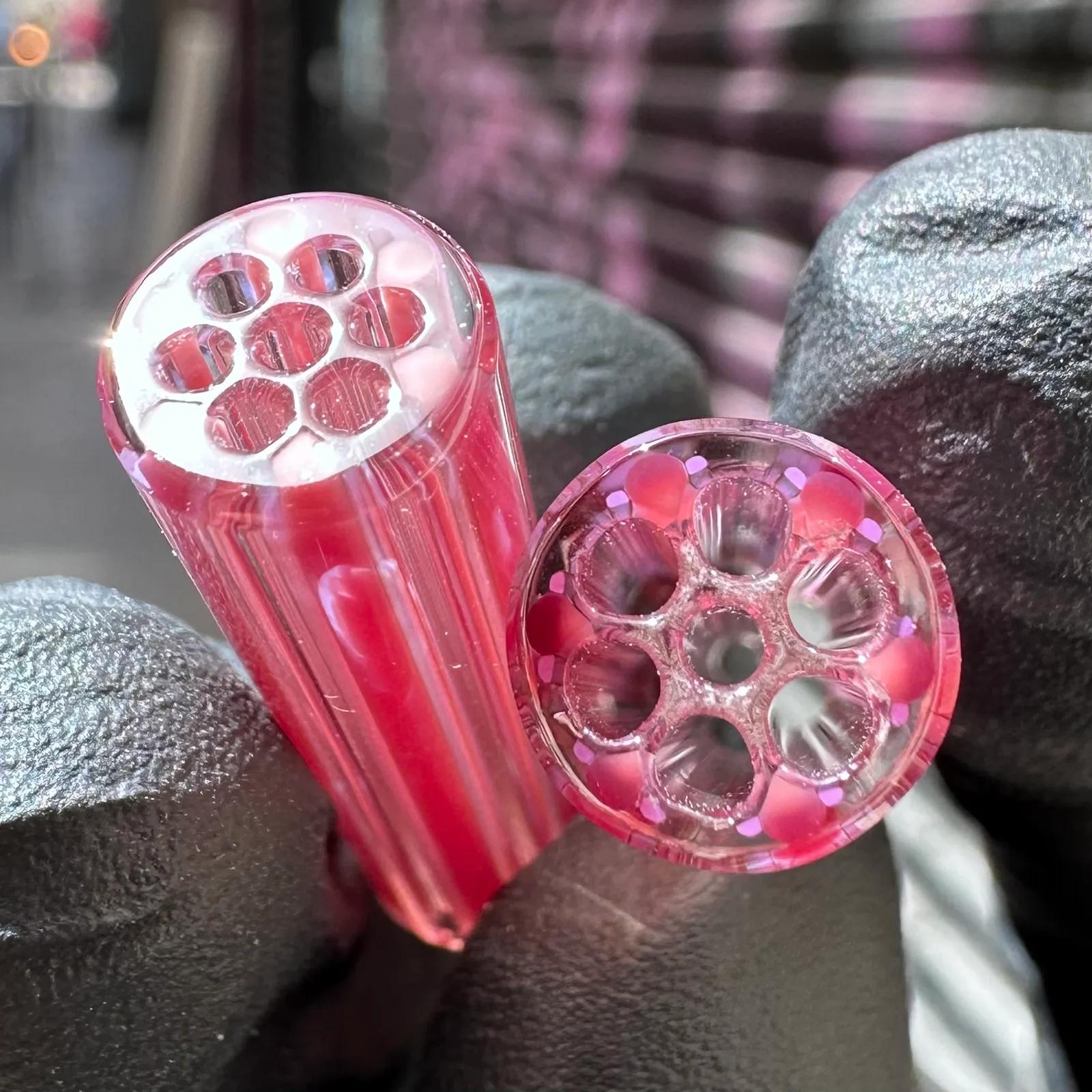Close-up of Metal Phoenix glass tips with pink violet borosilicate tones