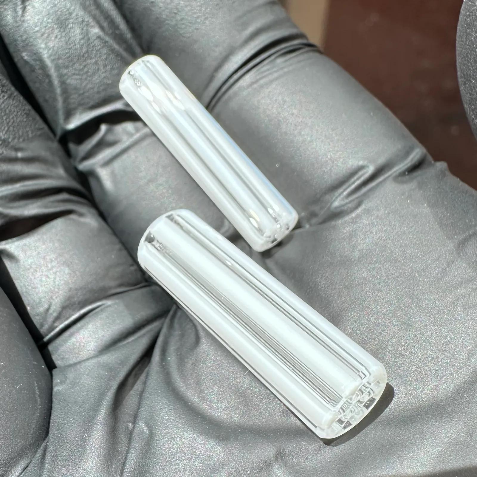 Close-up of Mr. White glass tips with white-on-white borosilicate pattern