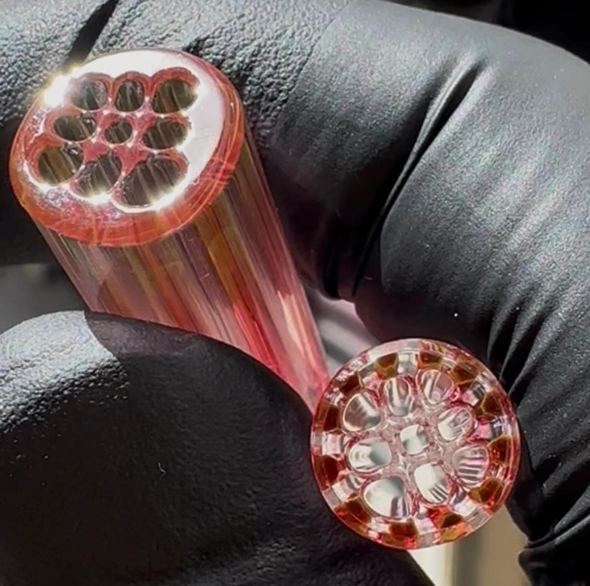 Close-up of Secret Gold Square glass tips with nine-channel square internal structure
