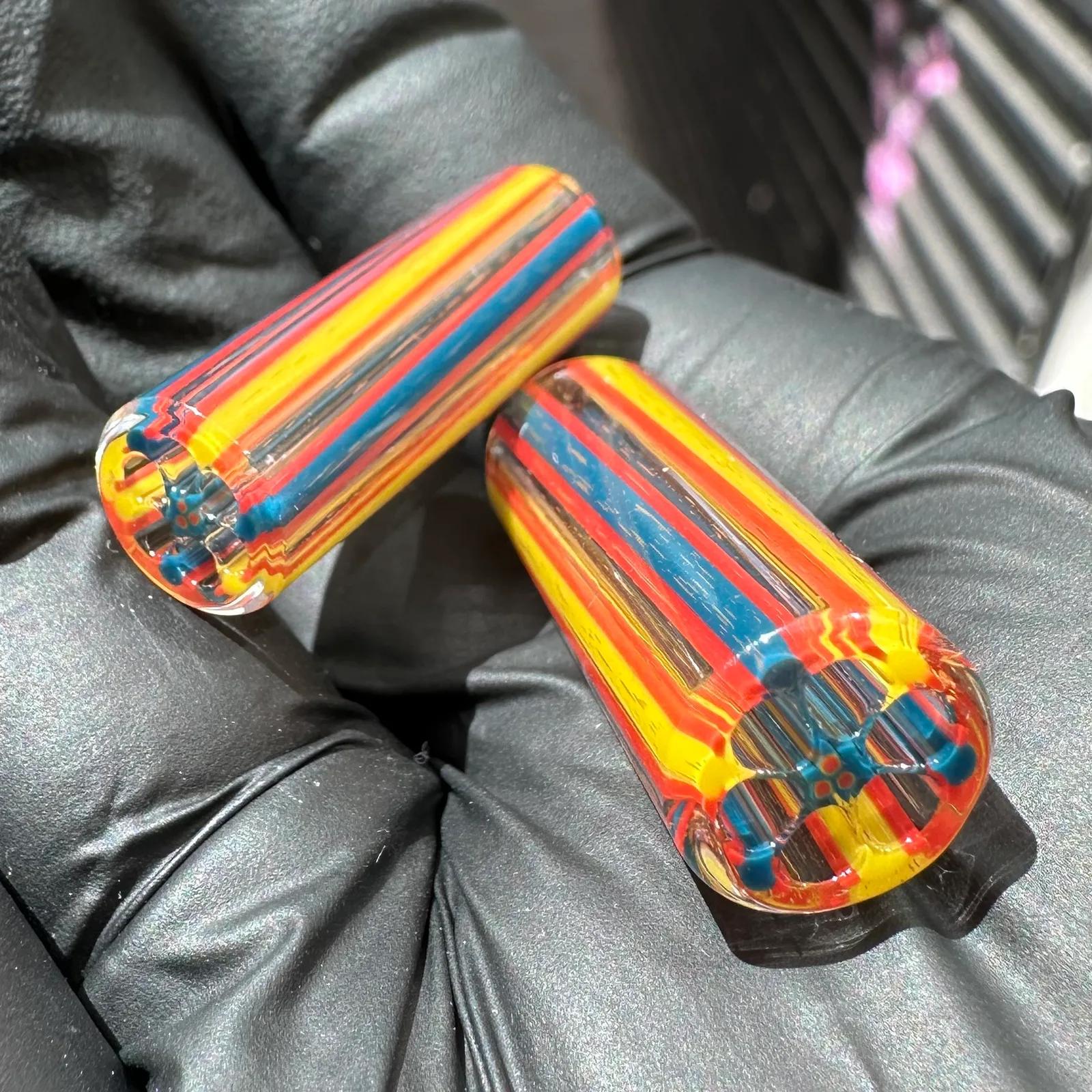 Cellcore borosilicate glass tips shown in hand for size reference